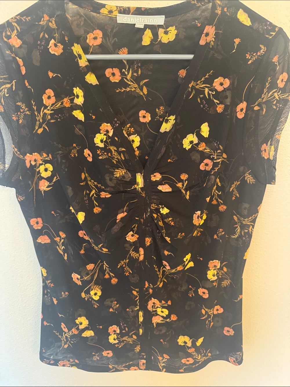 Daniel Rainn Black Floral V-Neck Twist Detail Top with Yellow and Peach Flowers
